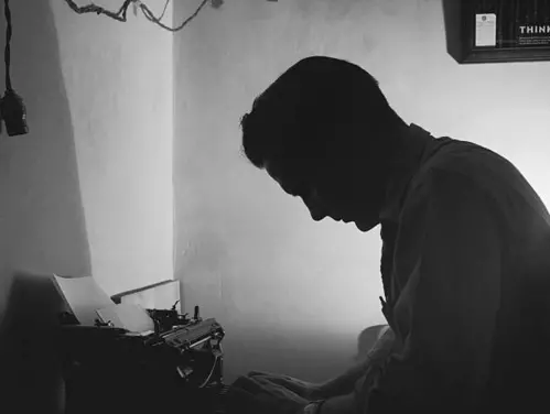 Offender at a typewriter