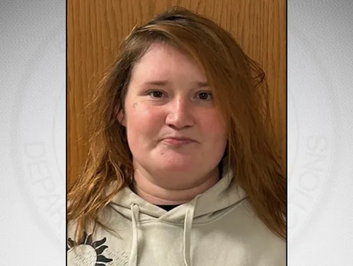 Olin in front of a gray background