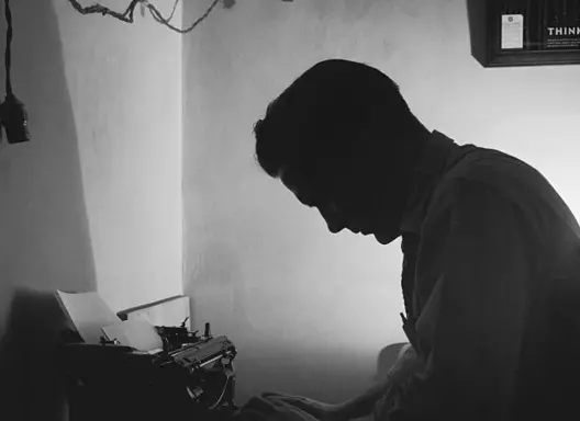 Offender at a typewriter